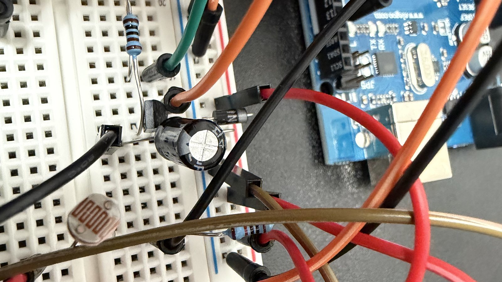 The transistor, resistor, diode and motor on the breadboard